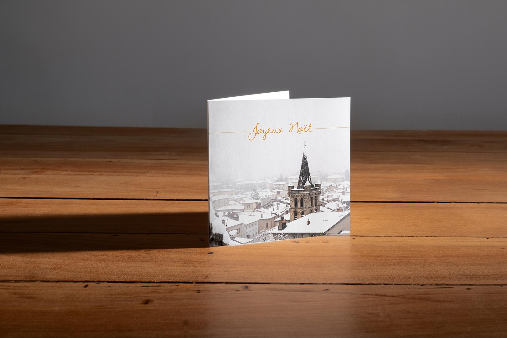 Une carte de vœux du clocher de l'église de Saint-Marcellin d'après photographie de Gaétan Mahé